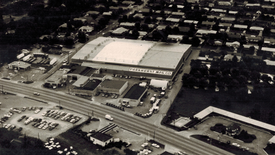 A black and white photo of the Parkhurst Manufacturing building