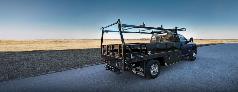 A Parkhurst HD Contractor Work Truck body parked by a jobsite