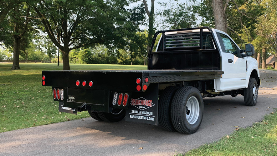 A Parkhurst Rancher Special truck body parked in a driveway
