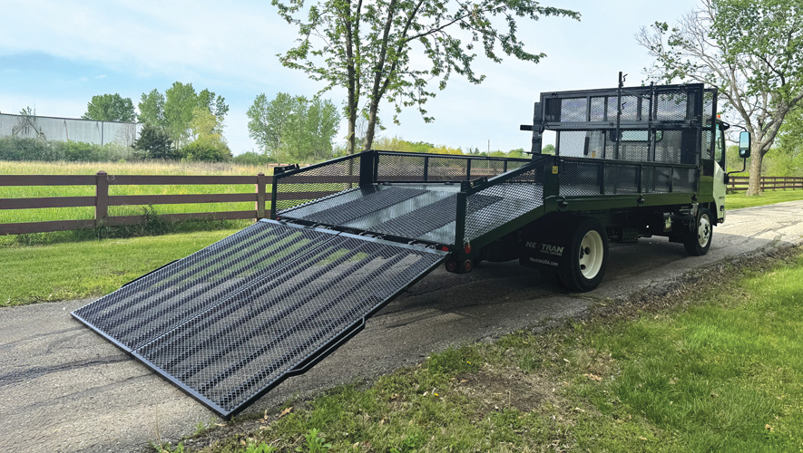 A Parkhurst specialty dovetail landscape body parked in a driveway