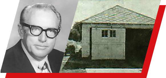 A black and white photo of William Parkhurst and the garage where it started