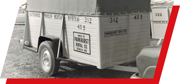 A black and white photo of a wooden wagon box