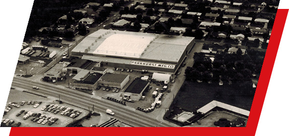 A black and white photo of the Parkhurst Manufacturing building