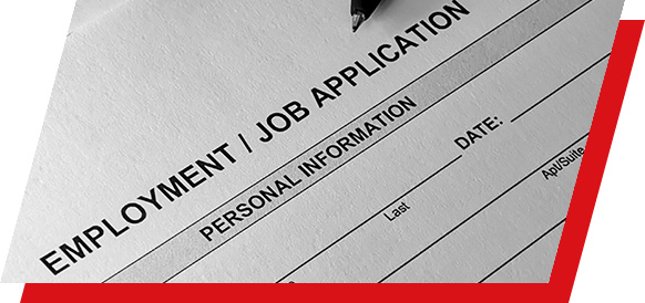 An employment application and pen