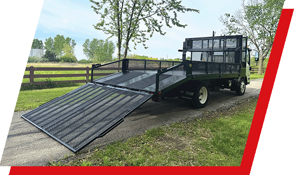 A Parkhurst specialty dovetail landscape body parked in a driveway