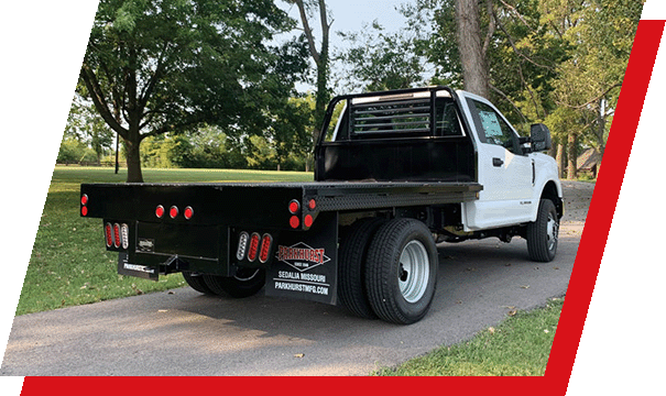 A Parkhurst Rancher Special truck body parked in a driveway