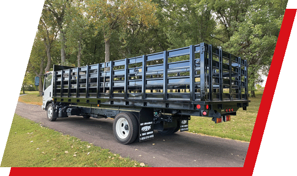 Side view of a truck with stake racks